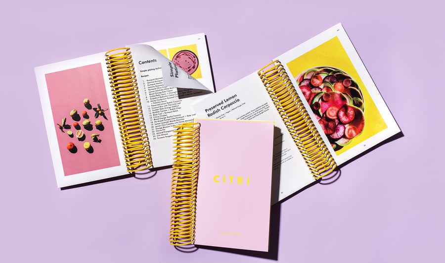 An ode to citrus. Loria Stern's first cookbook featuring 25 original recipes highlighting different varieties of citrus. Includes breads, cakes, crackers, salads, dips, beverages, fish, and chicken dishes, and emphasizes artful presentation and creative methodology. Recipes include vegan, gluten free, paleo options.<br/> Designed by Rafael Pulido