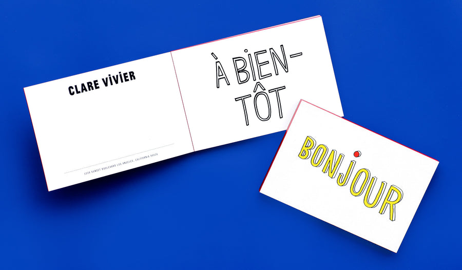 The Clare V. postcard notepad features 12 double-thick cards with red colored edges in the bag designer's signature hand-drawn, Francophile style, including Merci, Bonjour, A Bientot and Keep in Touch. Personalize the cards by adding your name and address to the back.