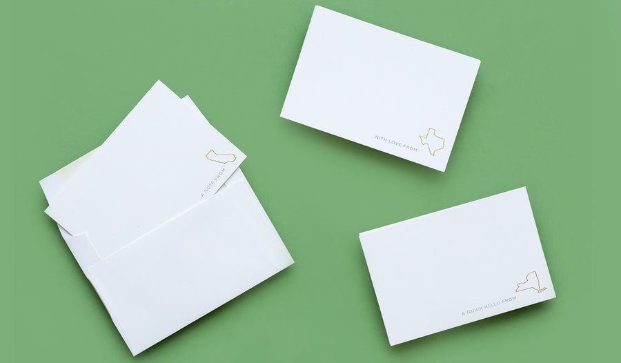 Introducing the State Series by jeweler Maya Brenner. Choose from three states stamped in rich gold foil onto our signature, double-thick eggshell card stock and bundled with matching envelopes. Create classic correspondence on these elegant cards to remind their recipients that it ain't where you're from, it's where you're at.