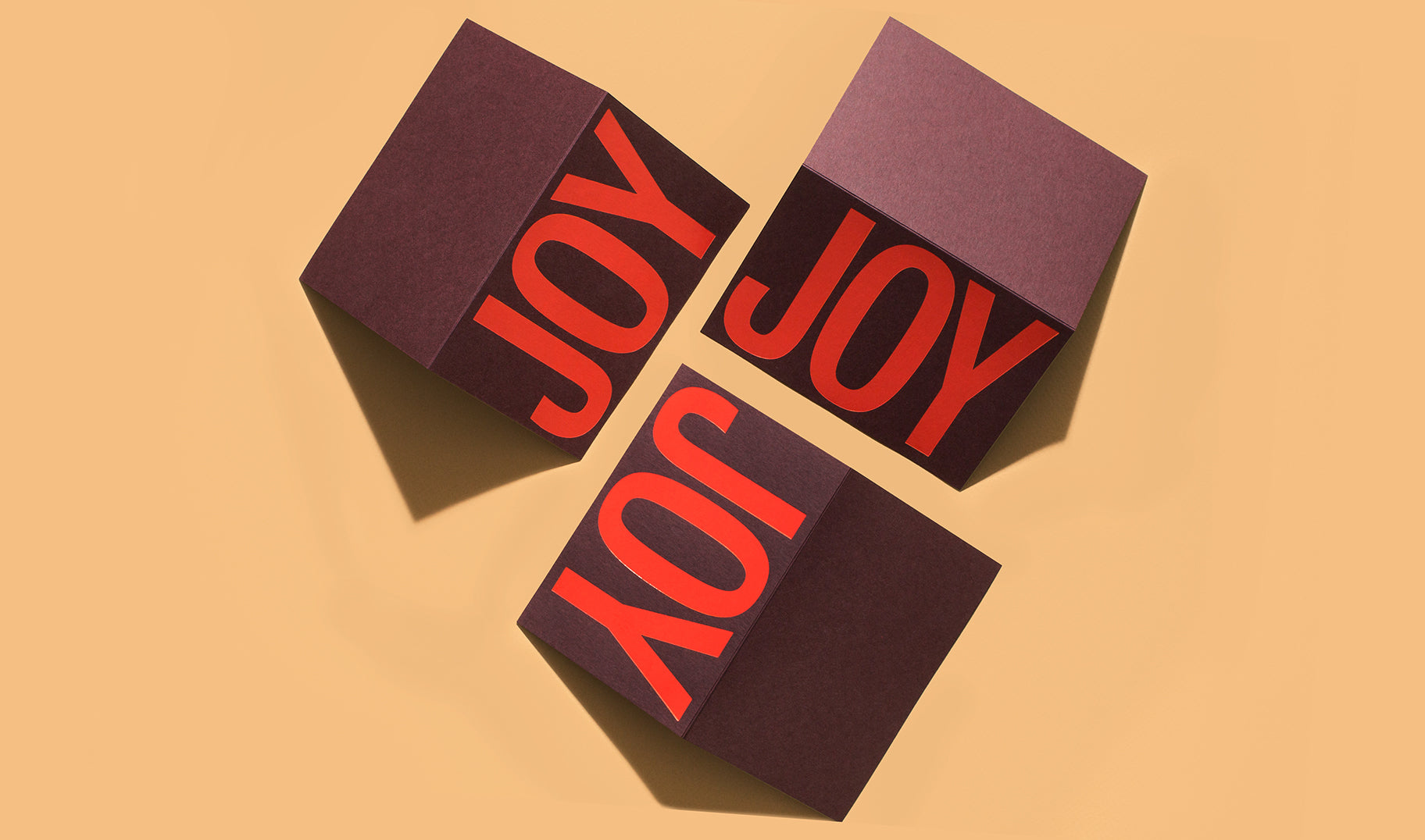 You will literally spread joy when you send these holiday cards. Featuring a orange foil on burgundy Mohawk Keaykolour paper.